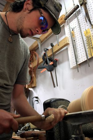 Justin, spring intern 2012, working on the lathe.